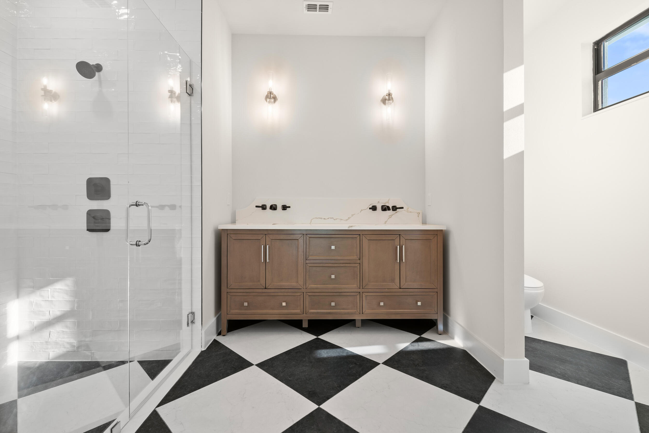 1142 Southwest Abbey Avenue Port St. Lucie, FL 34953 - Photo 42 of 57 a bathroom with a double vanity sink and mirror