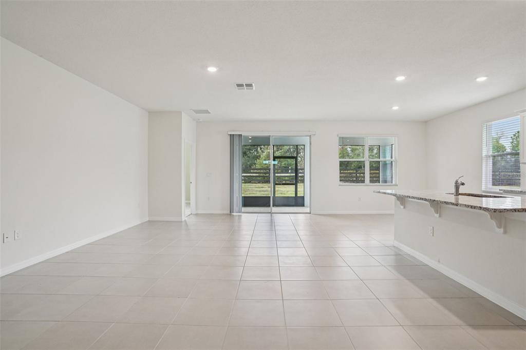 6203 Southwest 93rd Loop Ocala, FL 34476 - Photo 12 of 54 a view of an empty room with a window
