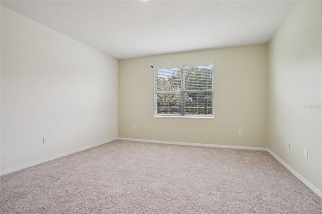 6203 Southwest 93rd Loop Ocala, FL 34476 - Photo 20 of 54 an empty room with windows