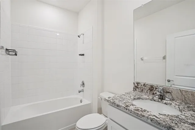 an empty room with a empty space and windows