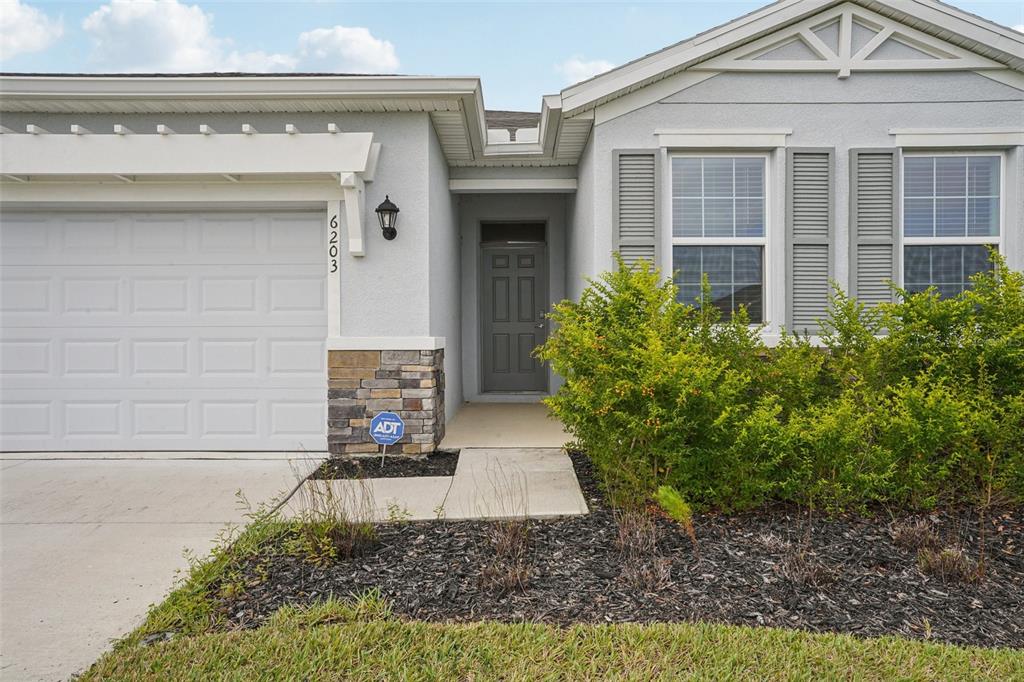 6203 Southwest 93rd Loop Ocala, FL 34476 - Photo 42 of 54 front view of a house