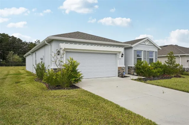 a view of an outdoor space and basketball court