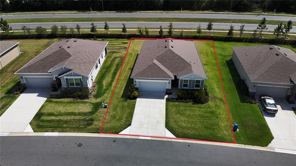 6203 Southwest 93rd Loop Ocala, FL 34476 - Photo 45 of 54 an aerial view of a house with a yard basket ball court and outdoor seating