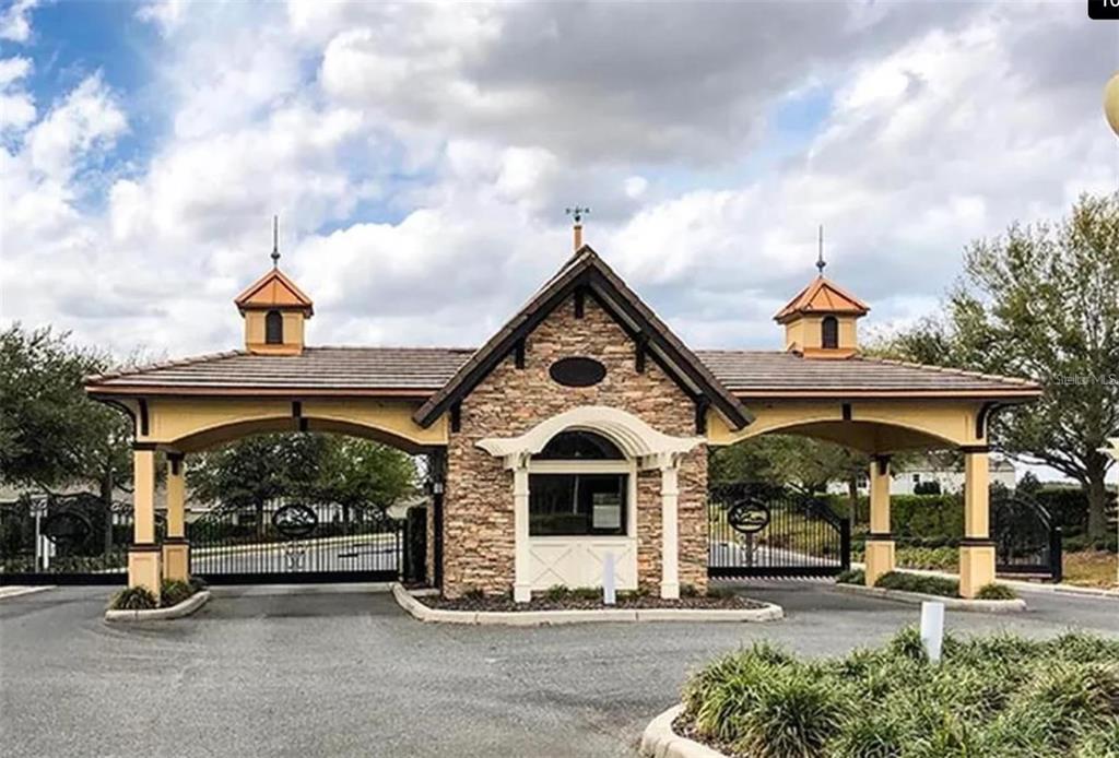 6203 Southwest 93rd Loop Ocala, FL 34476 - Photo 47 of 54 a front view of a building with garage