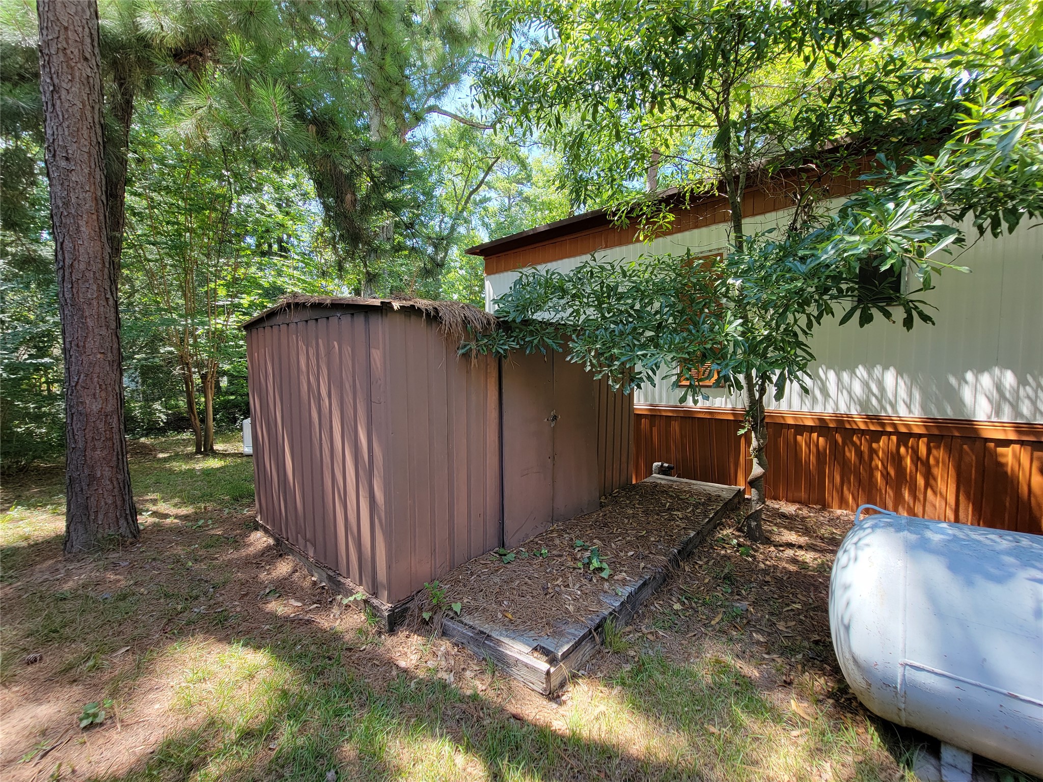 14245 East Ravine Willis, TX 77318 - Photo 17 of 23 Storage shed