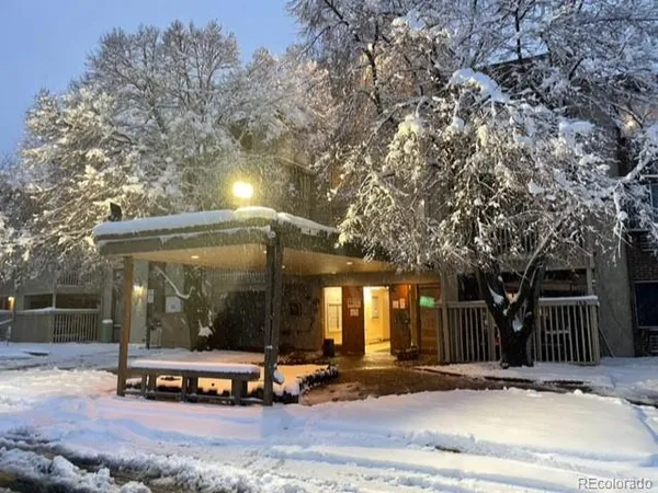 a view of a building with a bench