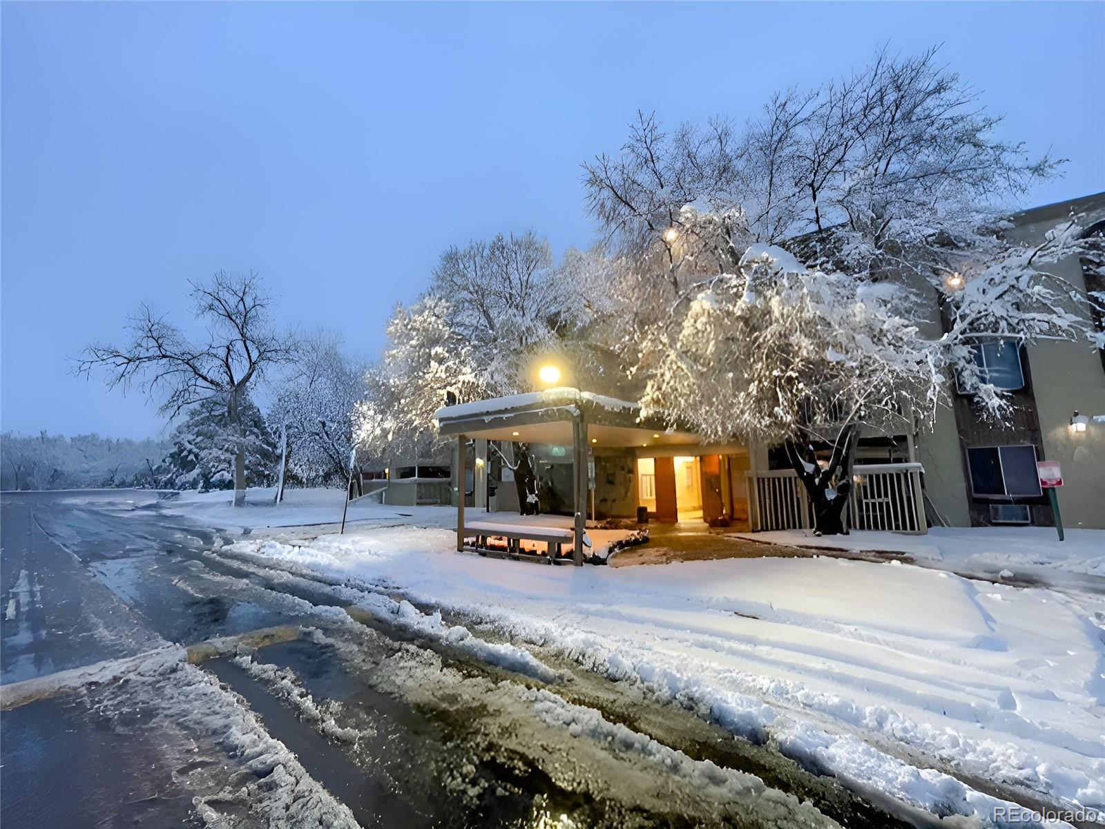 1304 South Parker Road, Unit 148 Denver, CO 80231 - Photo 2 of 23 a view of a yard with a house