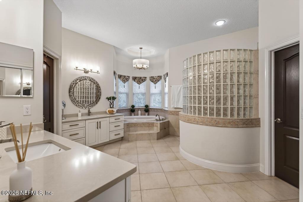 1483 Bridgette Way Fleming Island, FL 32003 - Photo 40 of 63 a large white kitchen with a large window