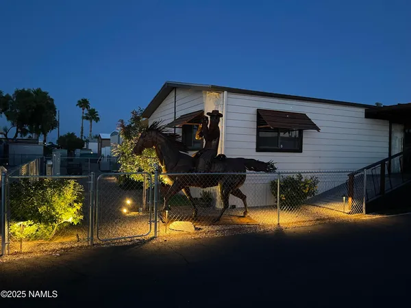 a view of an chairs and table on the wall