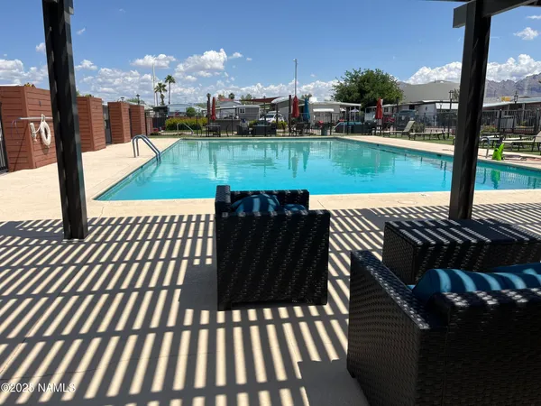 a view of swimming pool from balcony
