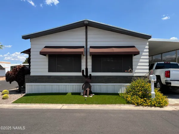 a front view of house with yard
