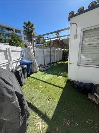 a view of a backyard of the house