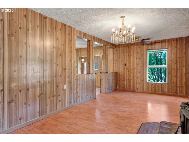 a view of a big room with a chandelier