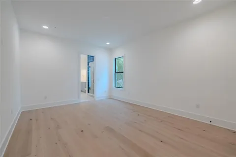 a view of a livingroom with wooden floor