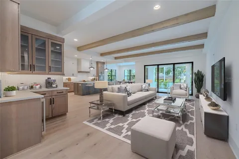 a kitchen with cabinets stainless steel appliances and sink