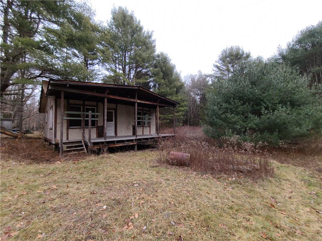 0 Gregory Road Monticello, NY 12701 - Photo 1 of 1 a view of an house with backyard space and porch