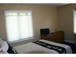 1203 Hazel Avenue Campbell, CA 95008 - Photo 6 of 9 a bedroom with a bed and a window