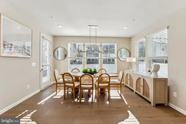 a kitchen with stainless steel appliances a stove a sink and cabinets
