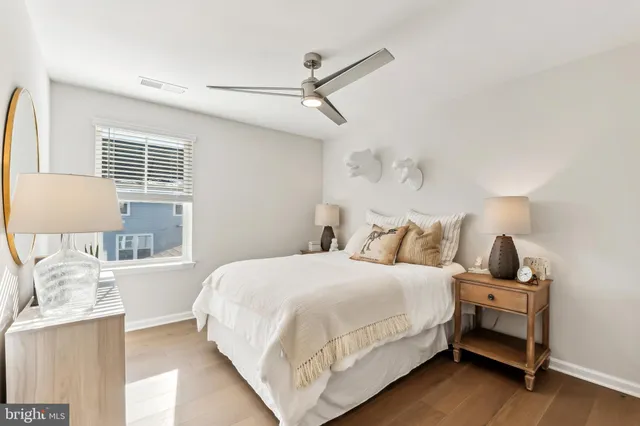 a bathroom with a double vanity sink and mirror