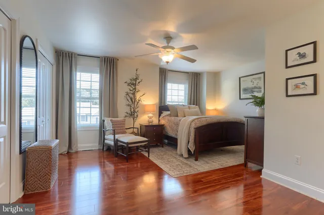 a view of a livingroom with furniture and wooden floor