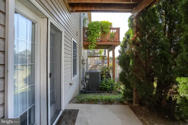 a view of an ocean with a building in the background