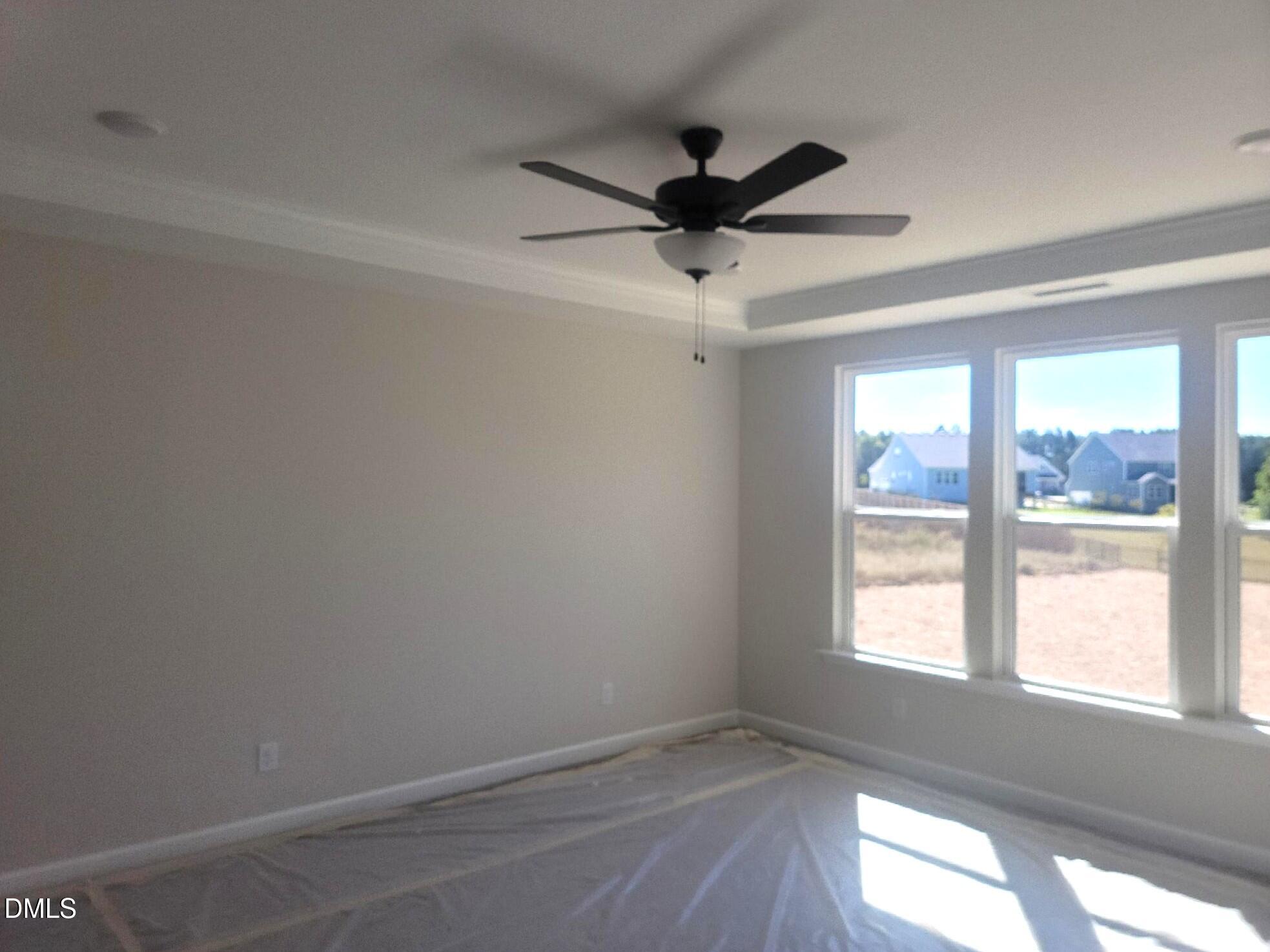 409 Grading Stick Court Angier, NC 27501 - Photo 46 of 52 a view of an empty room and a window