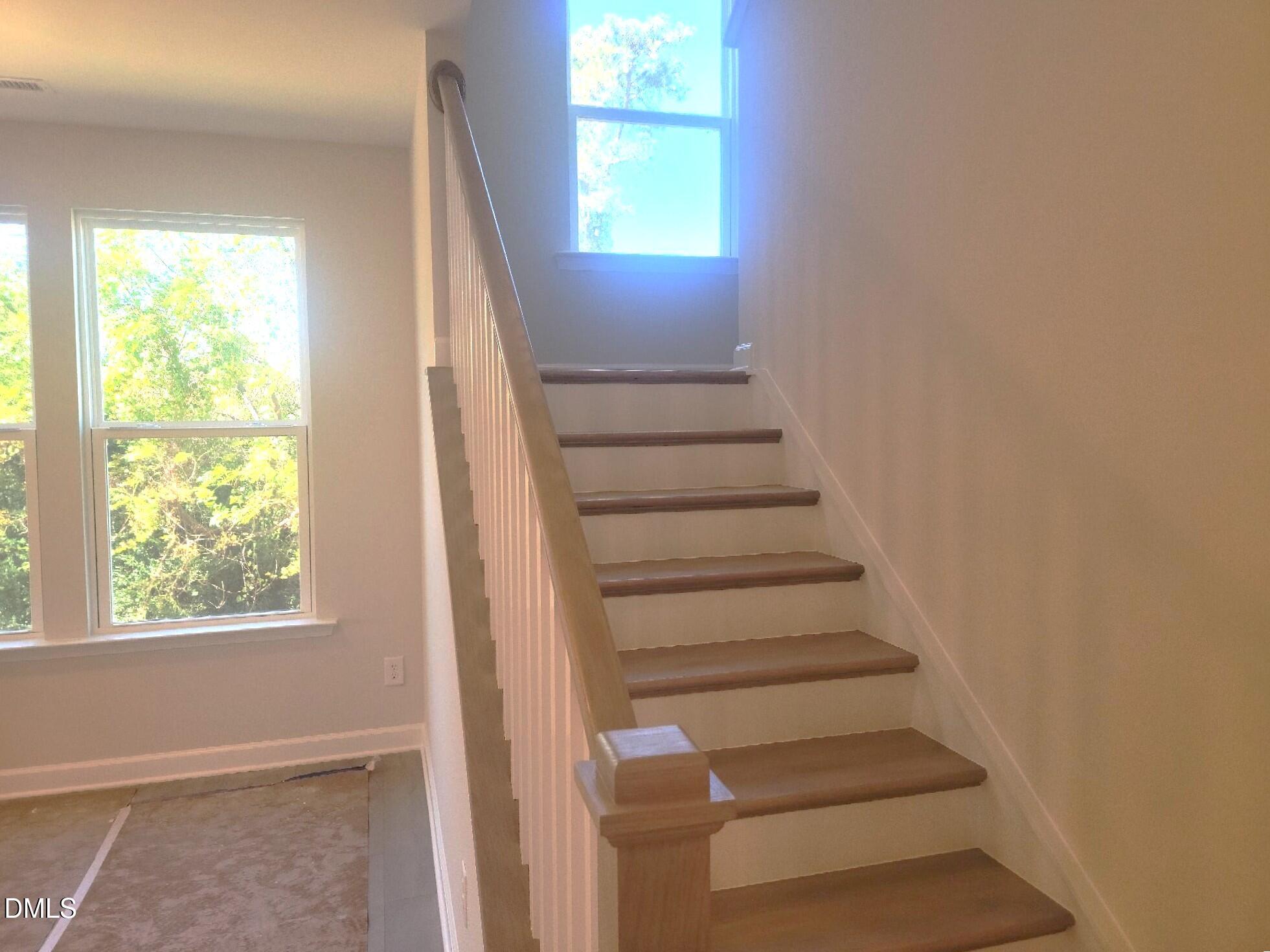 409 Grading Stick Court Angier, NC 27501 - Photo 47 of 52 a view of entryway and hall with wooden floor