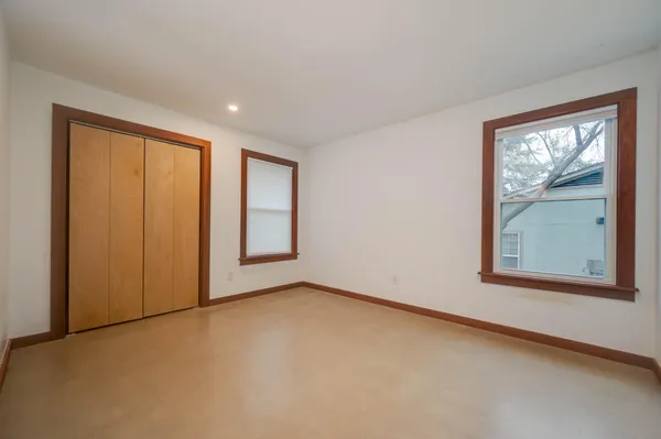 an empty room with windows