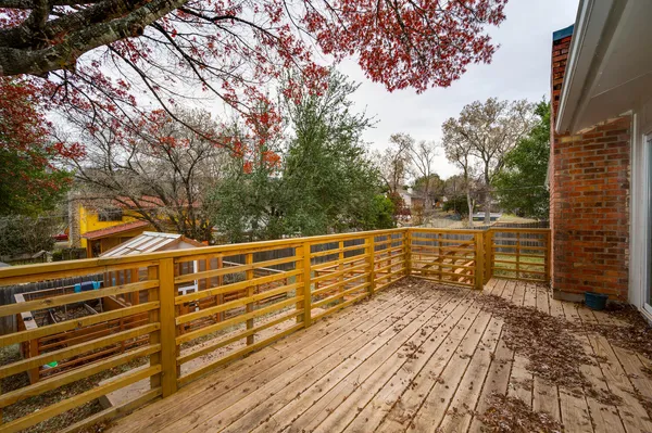 a view of outdoor space with garden and deck
