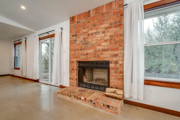 a view of an empty room and window