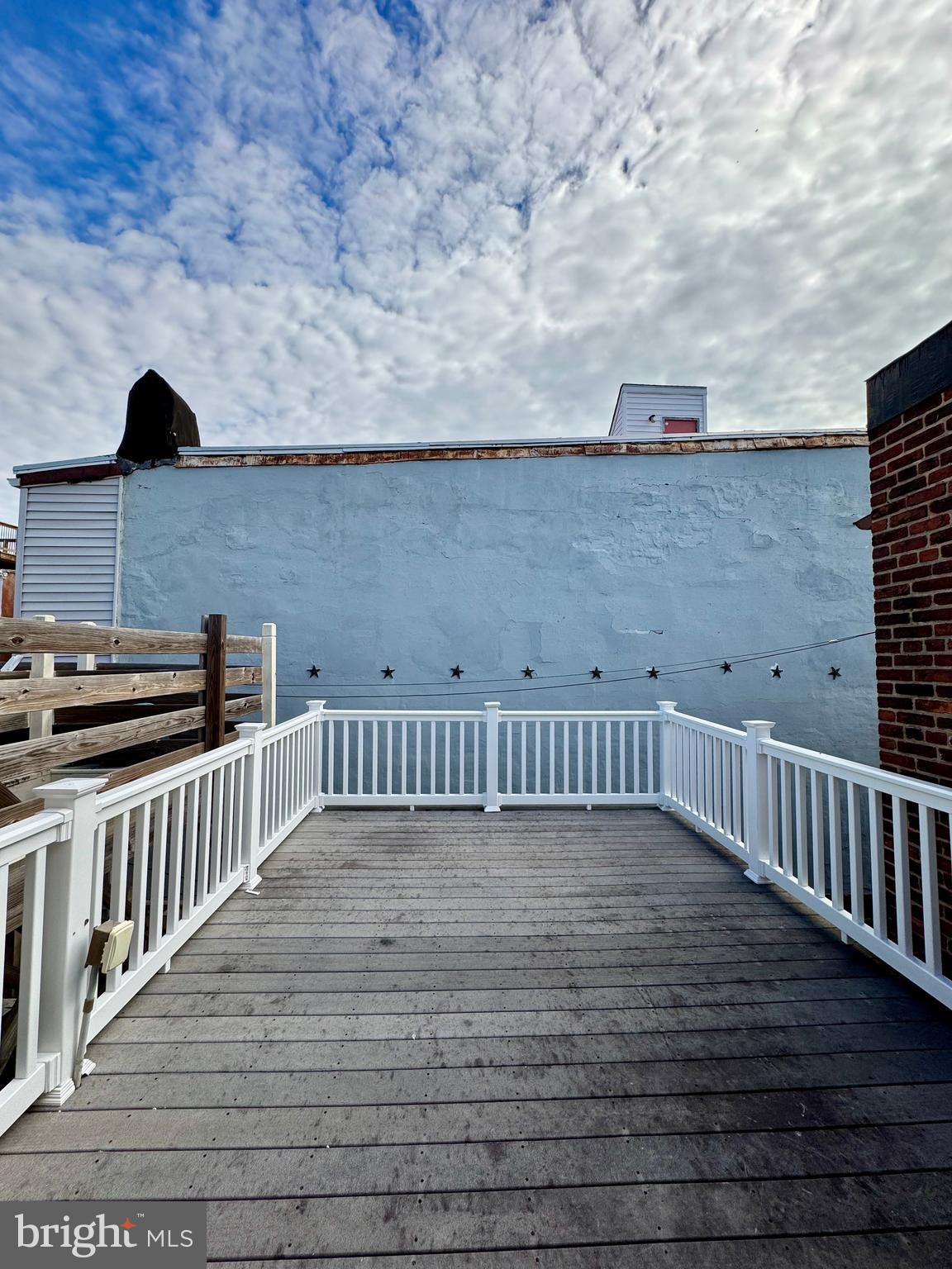 1313 Patapsco Street Baltimore, MD 21230 - Photo 17 of 20 a view of balcony with wooden floor