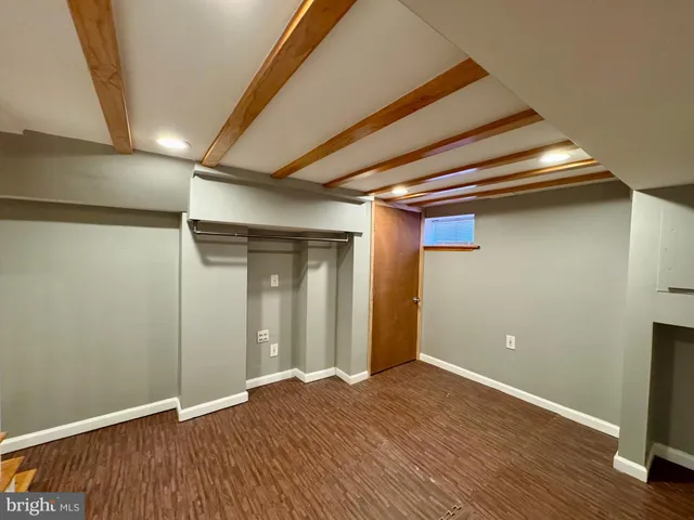 a view of a hallway with staircase