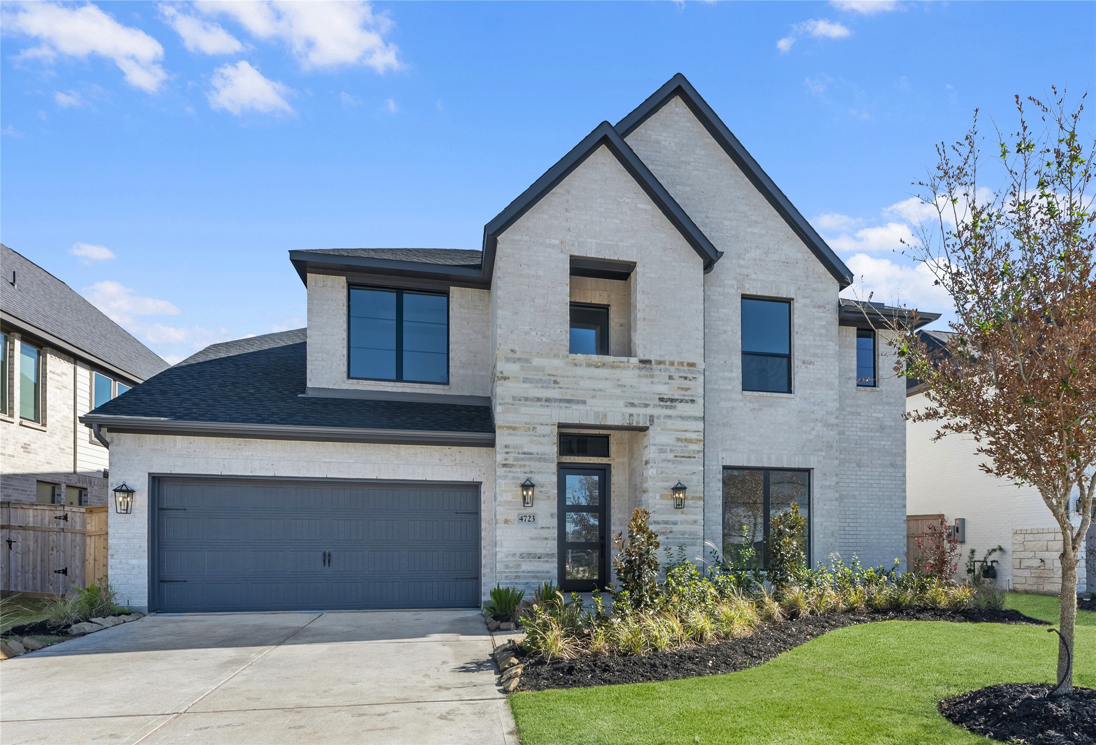 Move in Ready. Westin Homes *New Construction* Wilson Plan. Grass is digitally enhanced.