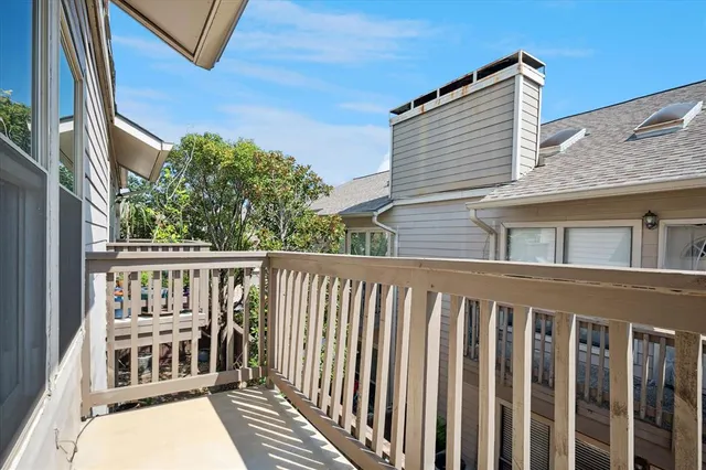 a balcony view with a sink