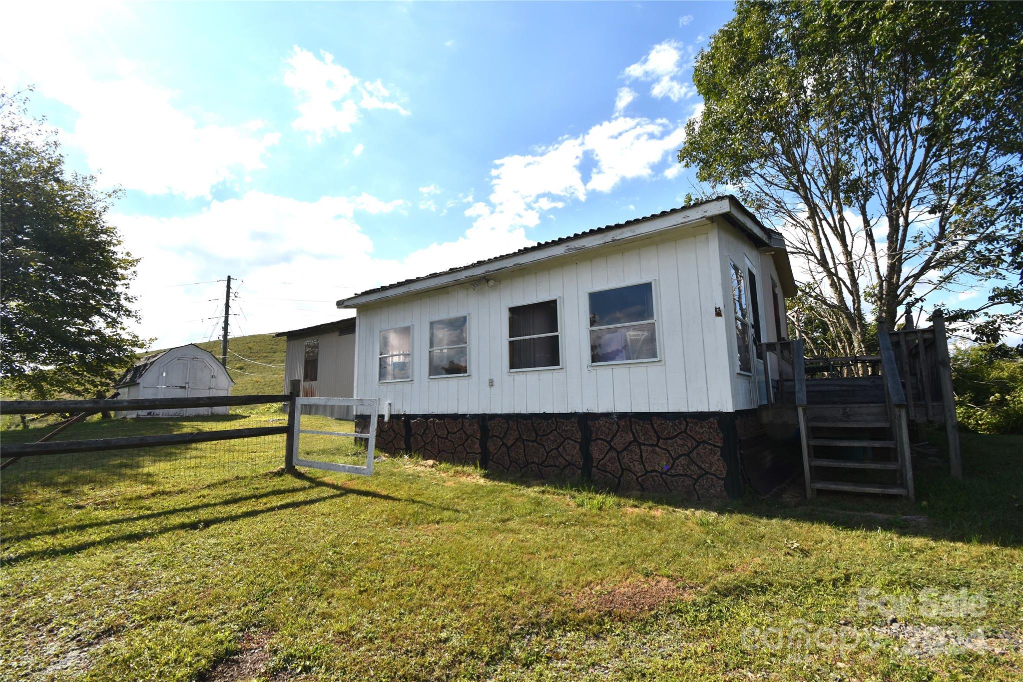 3387 Roaring Fork Road Creston, NC 28615 - Photo 2 of 19