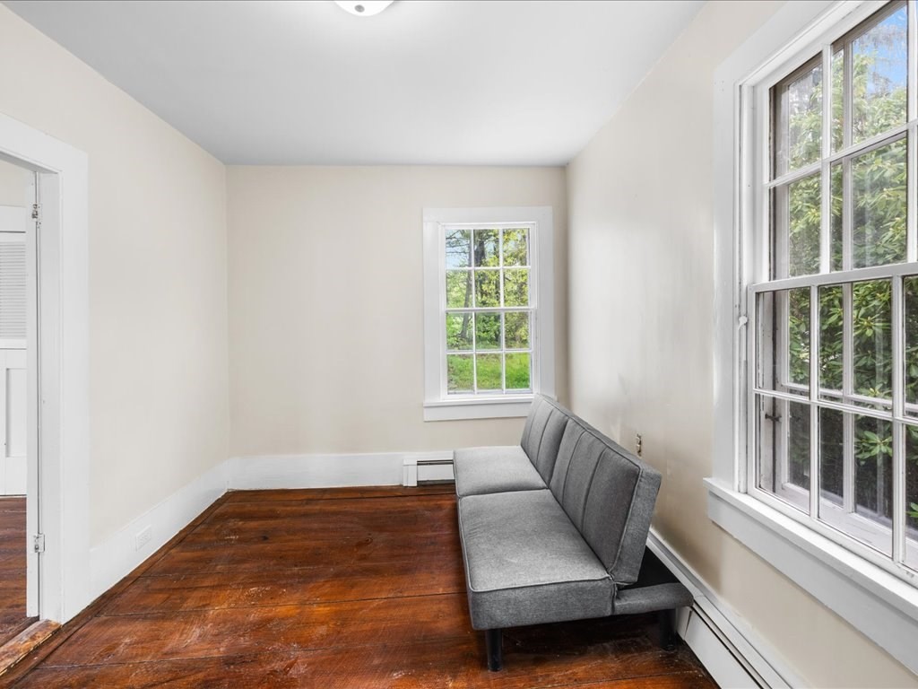5 Northeast Fitzwilliam Road Royalston, MA 01368 - Photo 22 of 37 a living room with furniture and a window