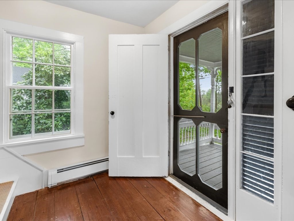 5 Northeast Fitzwilliam Road Royalston, MA 01368 - Photo 10 of 37 a view of an empty room with wooden floor and a window