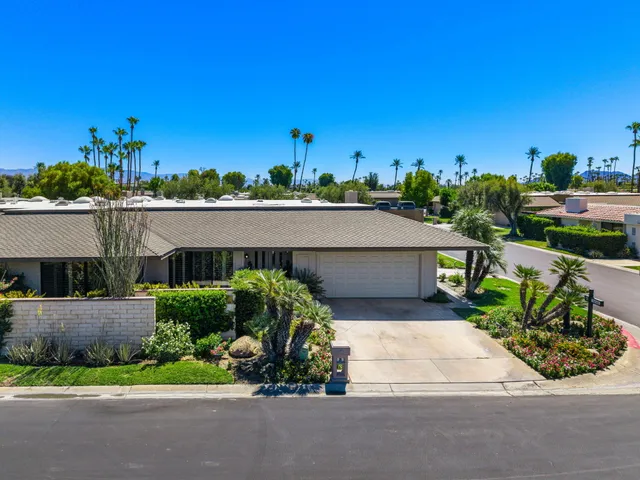 front view of a house with a street