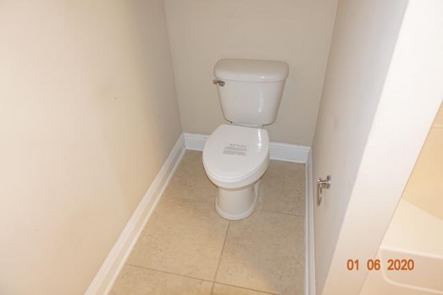 66 Pin Oak Loop Santa Rosa Beach, FL 32459 - Photo 14 of 32 a close view of a toilet in a bathroom