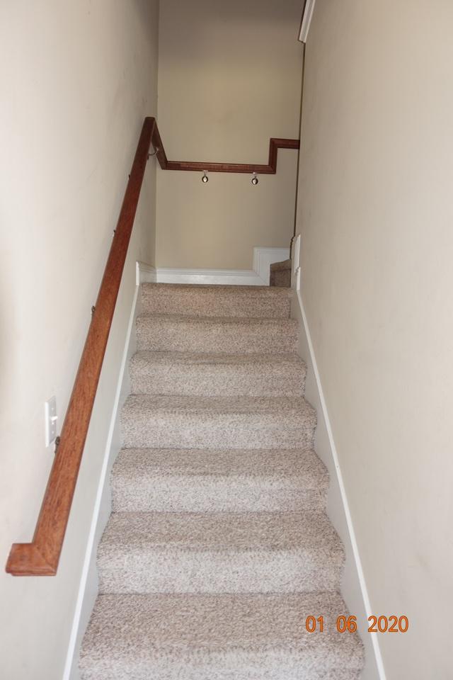 66 Pin Oak Loop Santa Rosa Beach, FL 32459 - Photo 15 of 32 a view of staircase with white walls