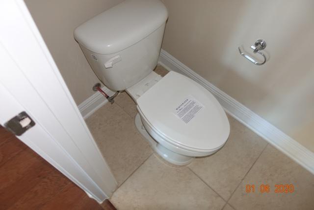 66 Pin Oak Loop Santa Rosa Beach, FL 32459 - Photo 18 of 32 a bathroom with a toilet and a rug