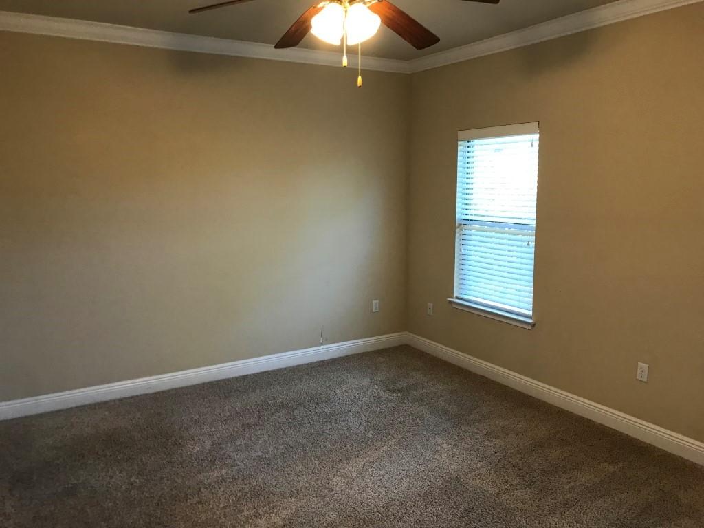 66 Pin Oak Loop Santa Rosa Beach, FL 32459 - Photo 24 of 32 an empty room with a fan and a window