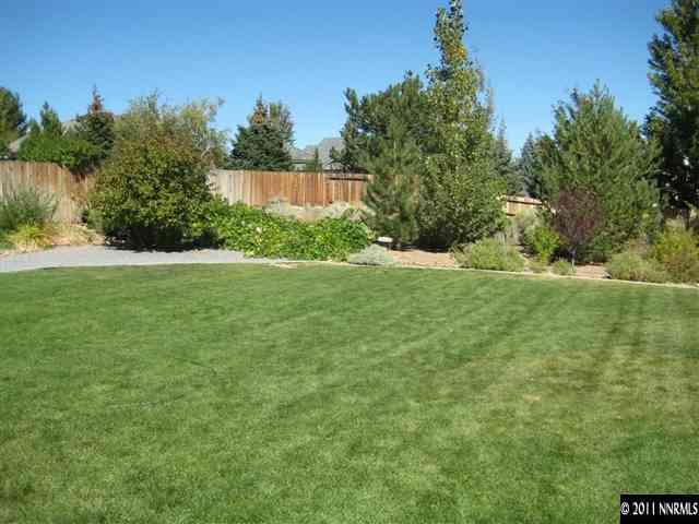 2265 Snowmass Drive Reno, NV 89511 - Photo 6 of 13 a view of a garden with a lake