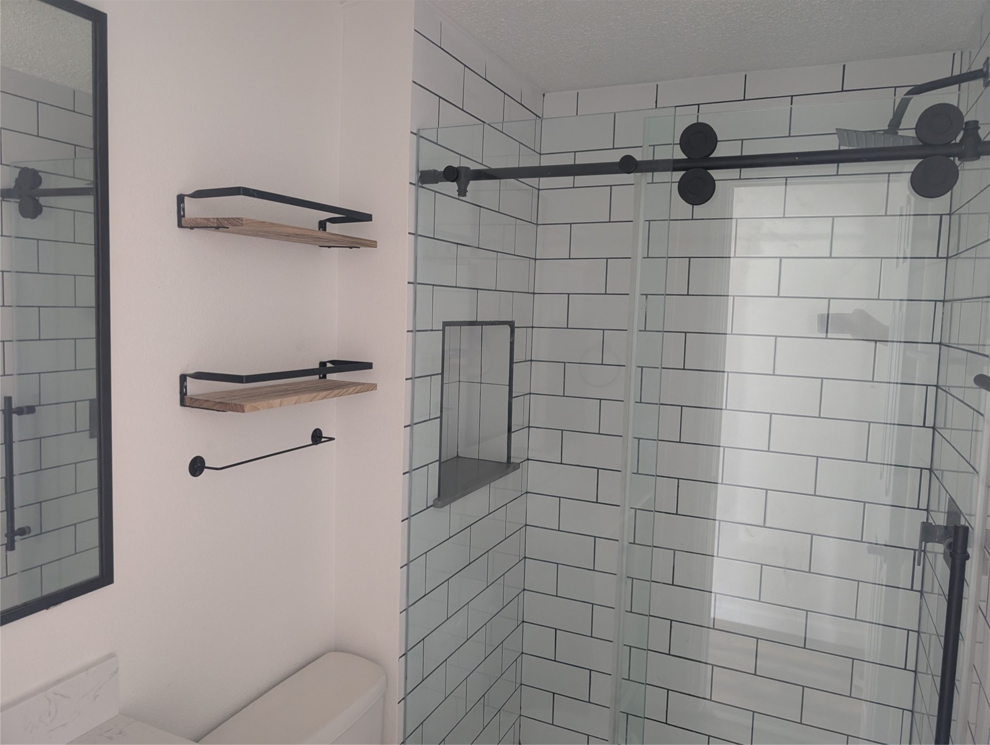 608 Country Road Cleveland, TX 77327 - Photo 8 of 9 a bathroom with a shower