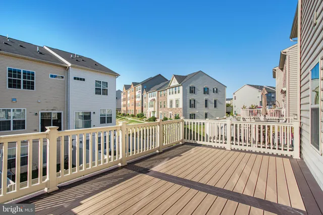 a view of a wooden chairs and a window
