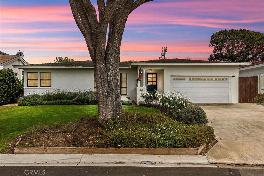 418 Pirate Road Newport Beach, CA 92663 - Photo 1 of 1 a front view of a house with garden