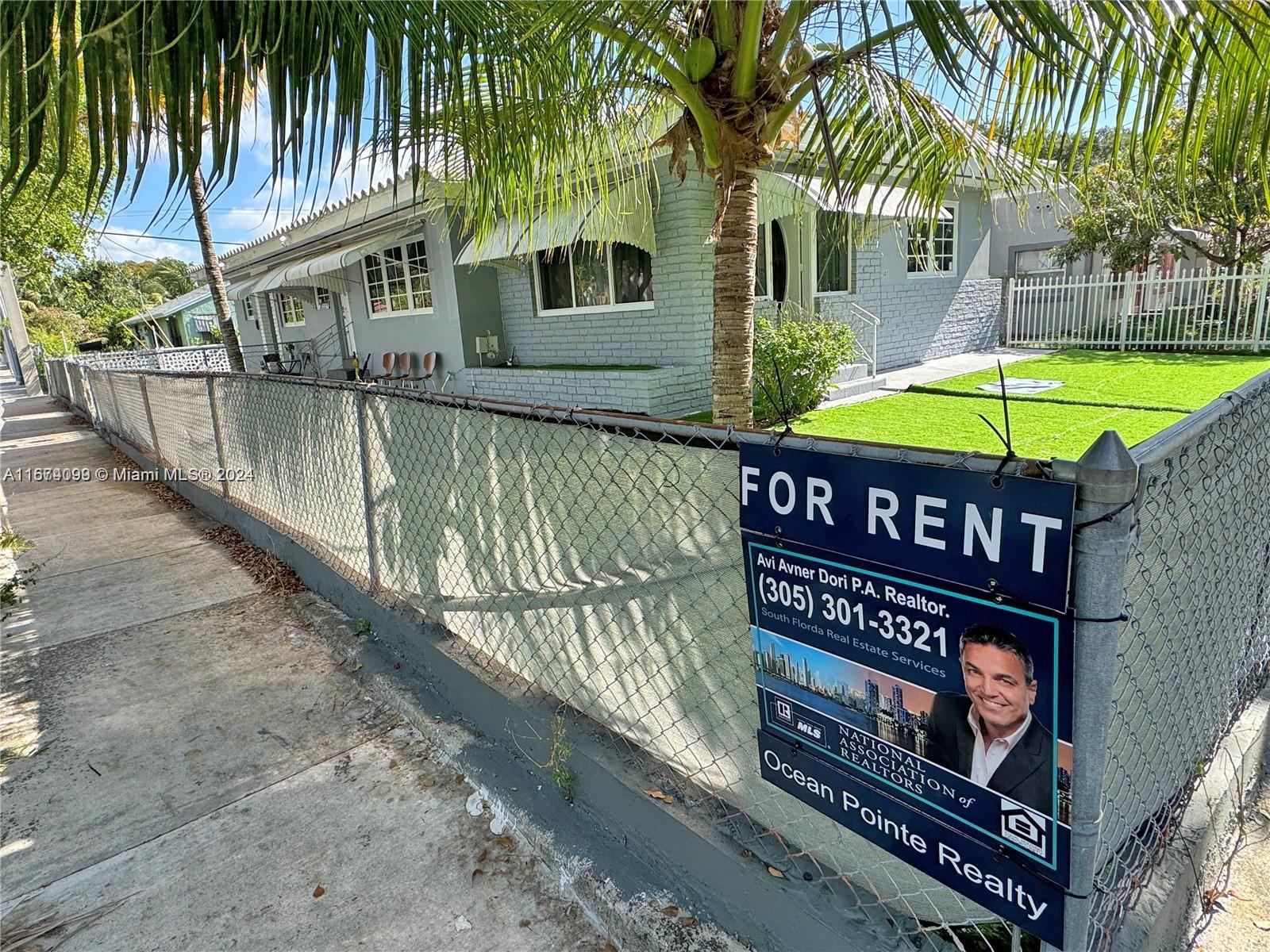 501 Northeast 70th Street, Unit 3 Miami, FL 33138 - Photo 2 of 11 a sign on the side of a building