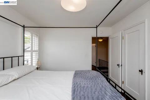 a view of a hallway with washer and dryer