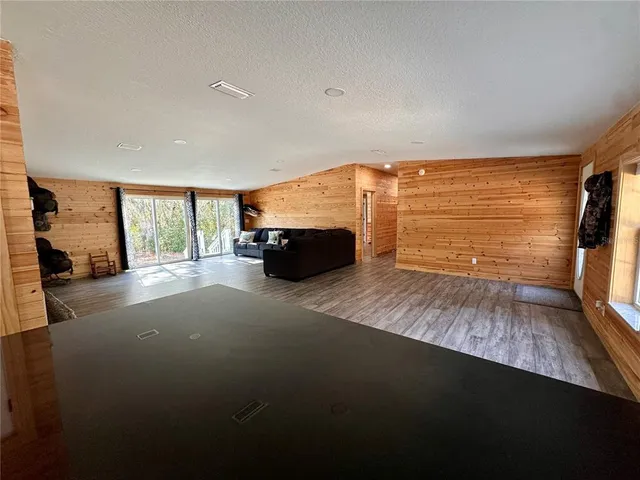 a bathroom with a sink toilet a mirror and window
