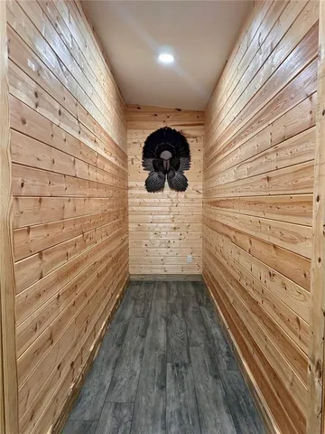 a bedroom with two beds and painted walls